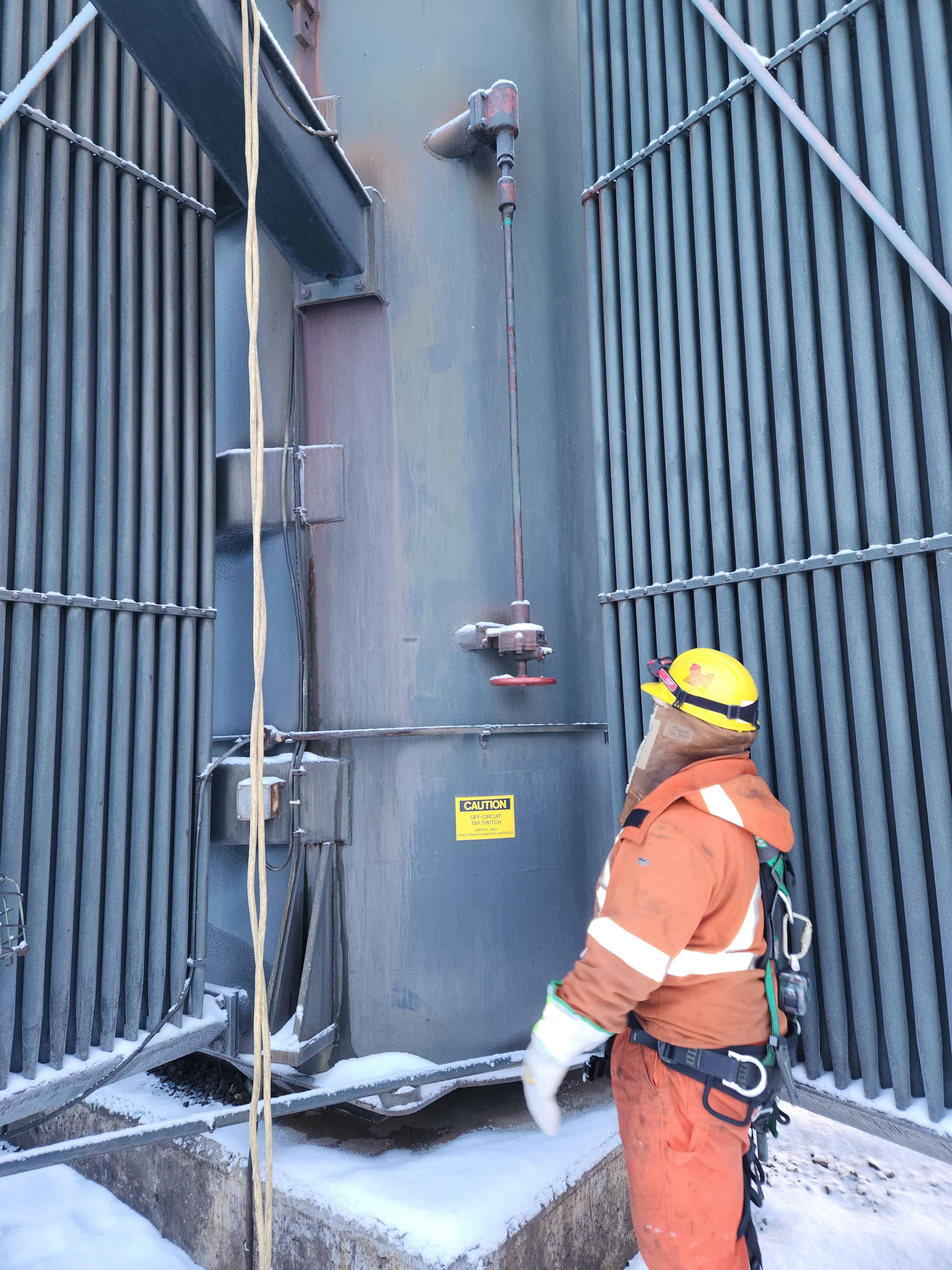 ETAC Technician Servicing a Transformer